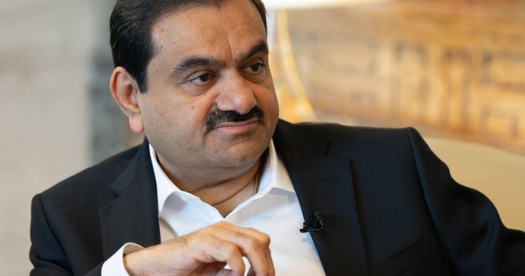 Judge dismisses charges against billionaire Adani, but sharply criticizes DOJ