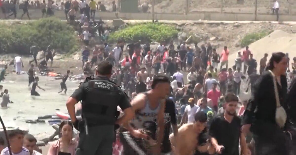 Thousands of migrants stream into Spain from Morocco, authorities report 9 dead