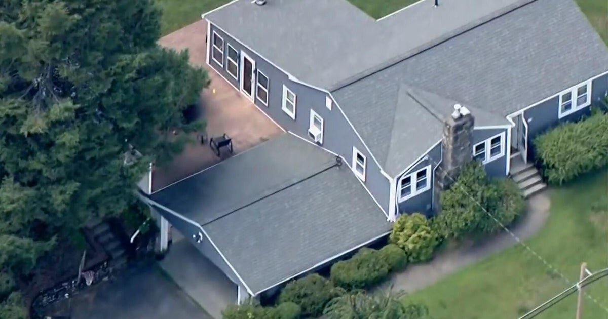 Manhunt on for Massachusetts wife of police officer found dead