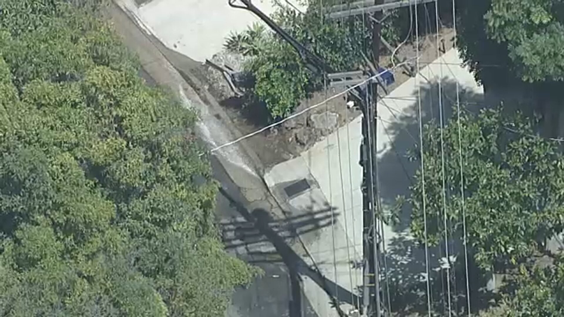 Water main break floods Hollywood Hills street near elementary school