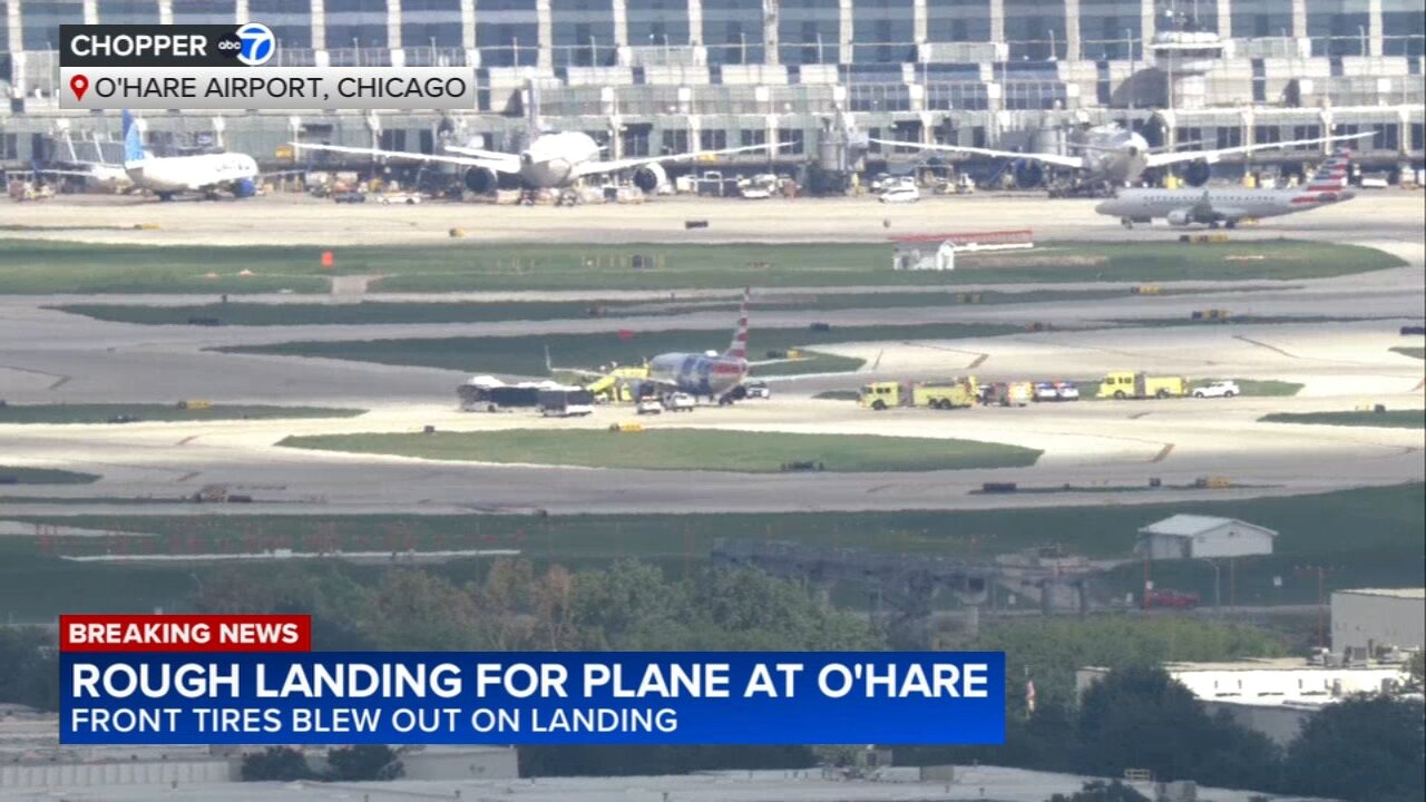 American Airlines flight blows tires landing at O'Hare airport; fire trucks, police cars seen around plane: FAA