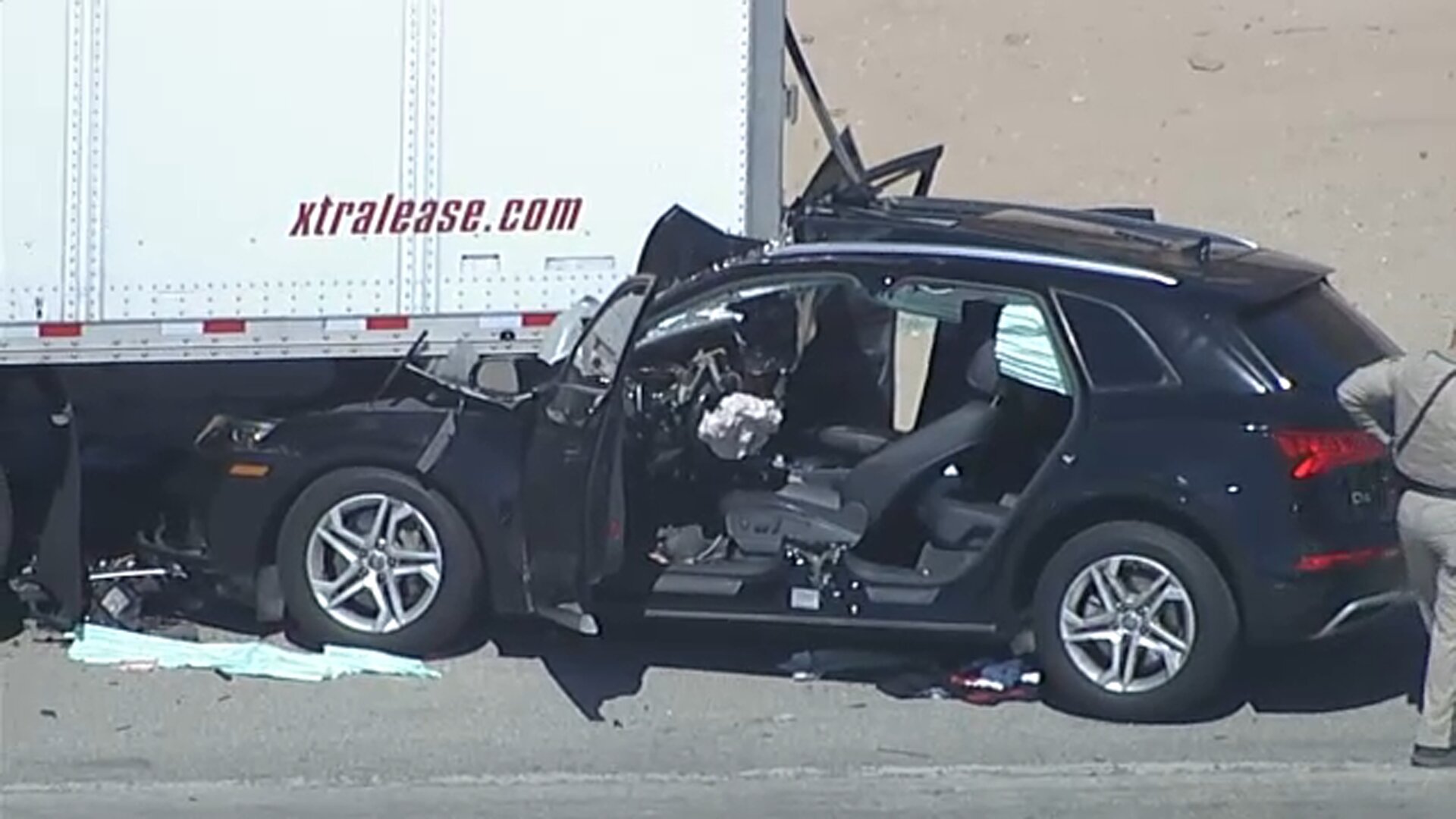 1 rescued after SUV gets trapped under semi-truck in crash on 5 Freeway in Sylmar