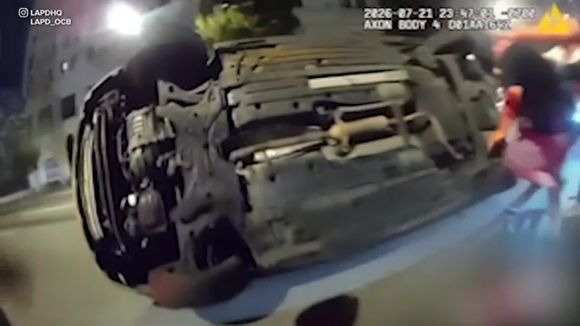 LAPD bodycam video shows dramatic rescue of person pinned under car after crash