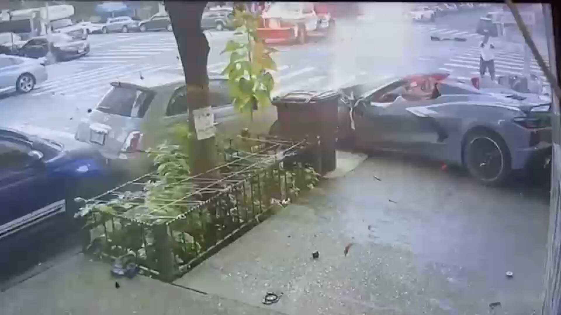 Pedestrian, 2 others hurt when cars crash and jump curb in Inwood