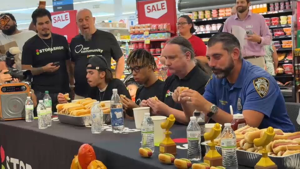 FDNY and NYPD battle it out during hot dog eating contest on Staten Island