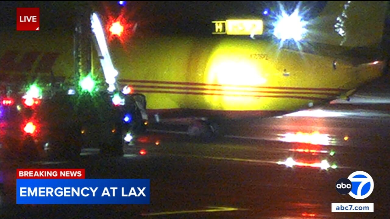 Tires on DHL plane appear to catch on fire upon landing at LAX