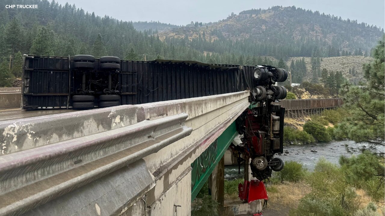 Big rig crash on I-80 near CA-NV border leaves truck hanging off bridge, CHP says
