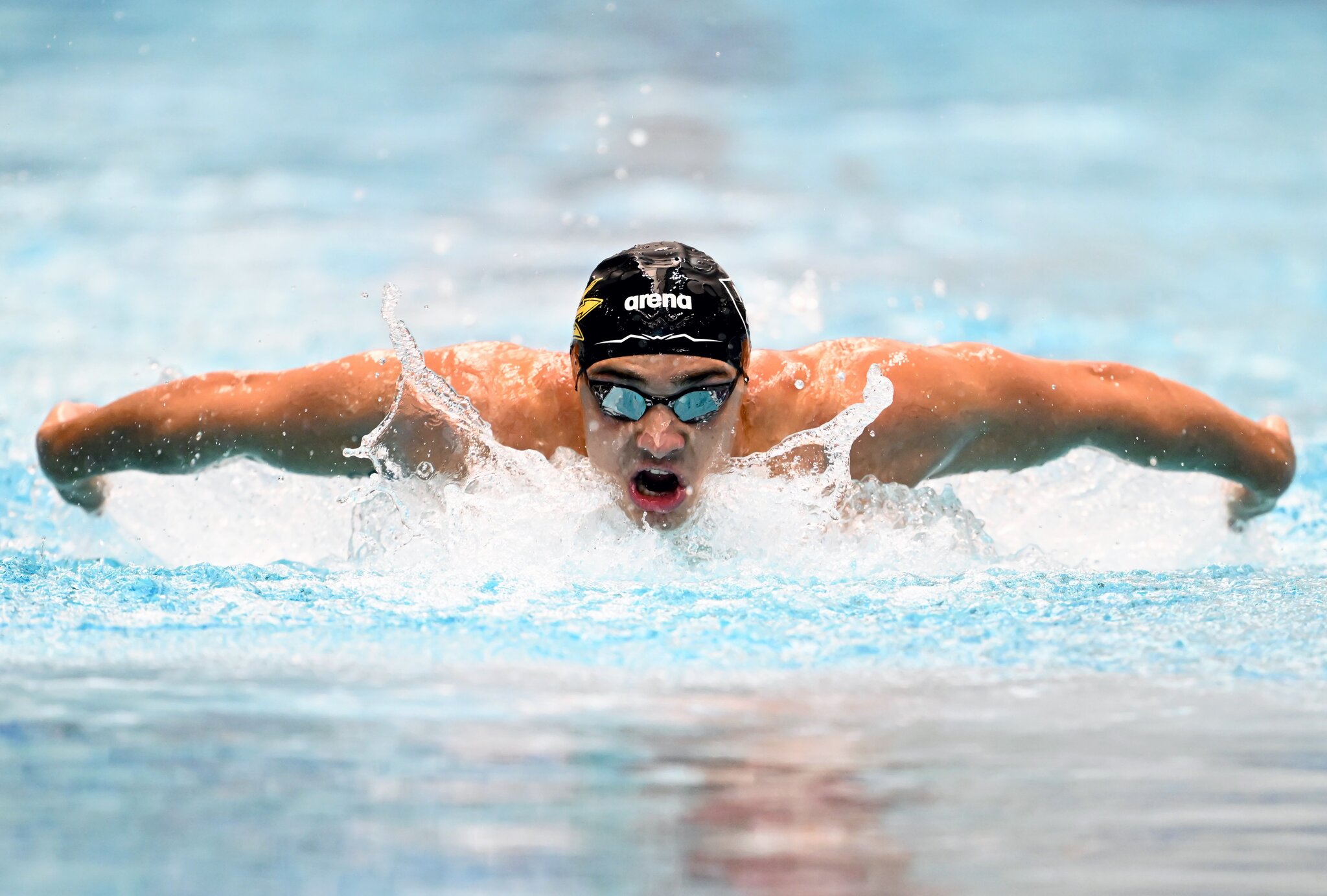 Ilya Kharun sets Meet and U.S. Open Record, out-touches Dressel, in 50 butterfly at U.S. Swimming Nationals