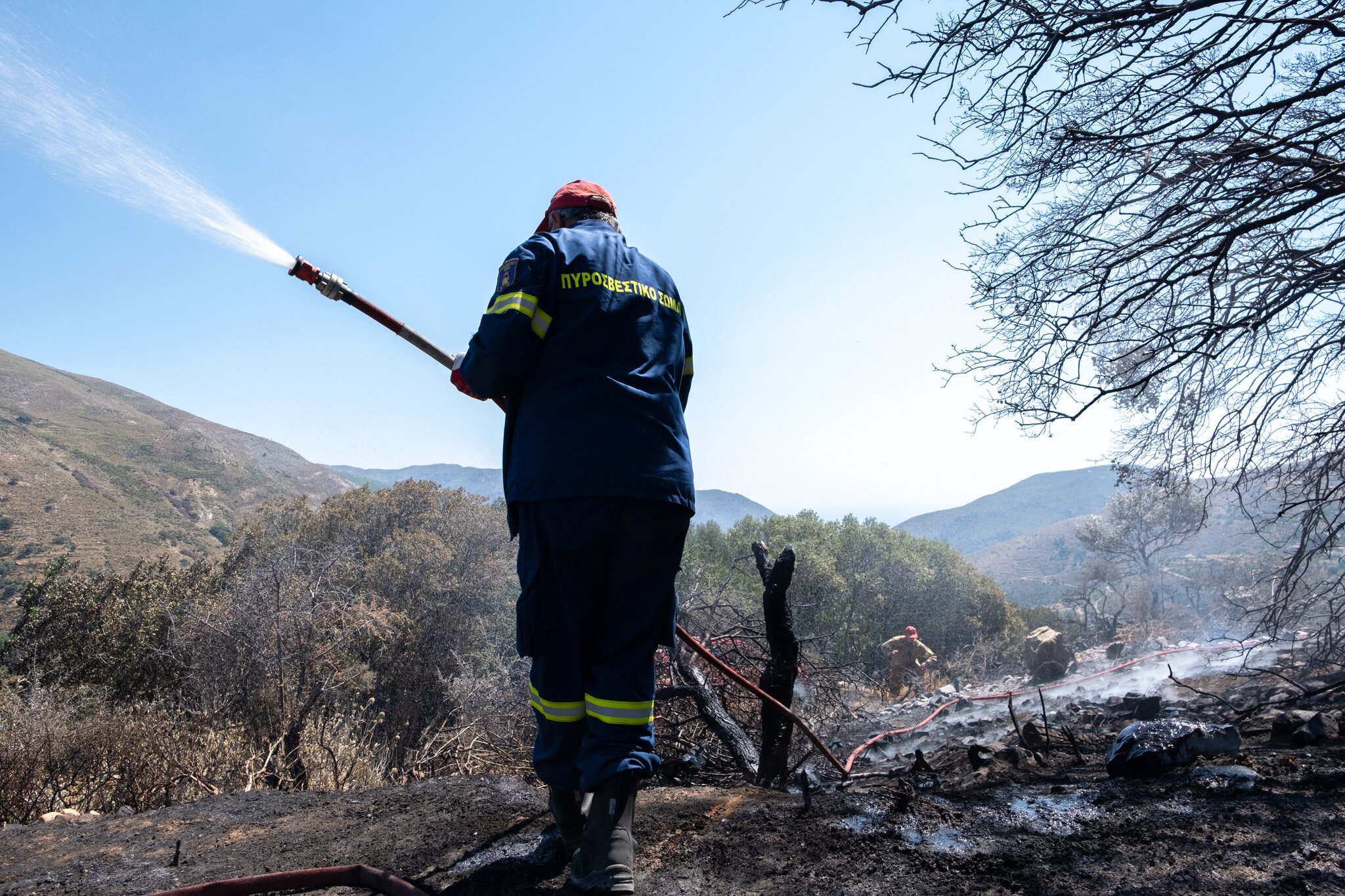 2 firefighters die in a wildfire on the southern Greek island of Crete