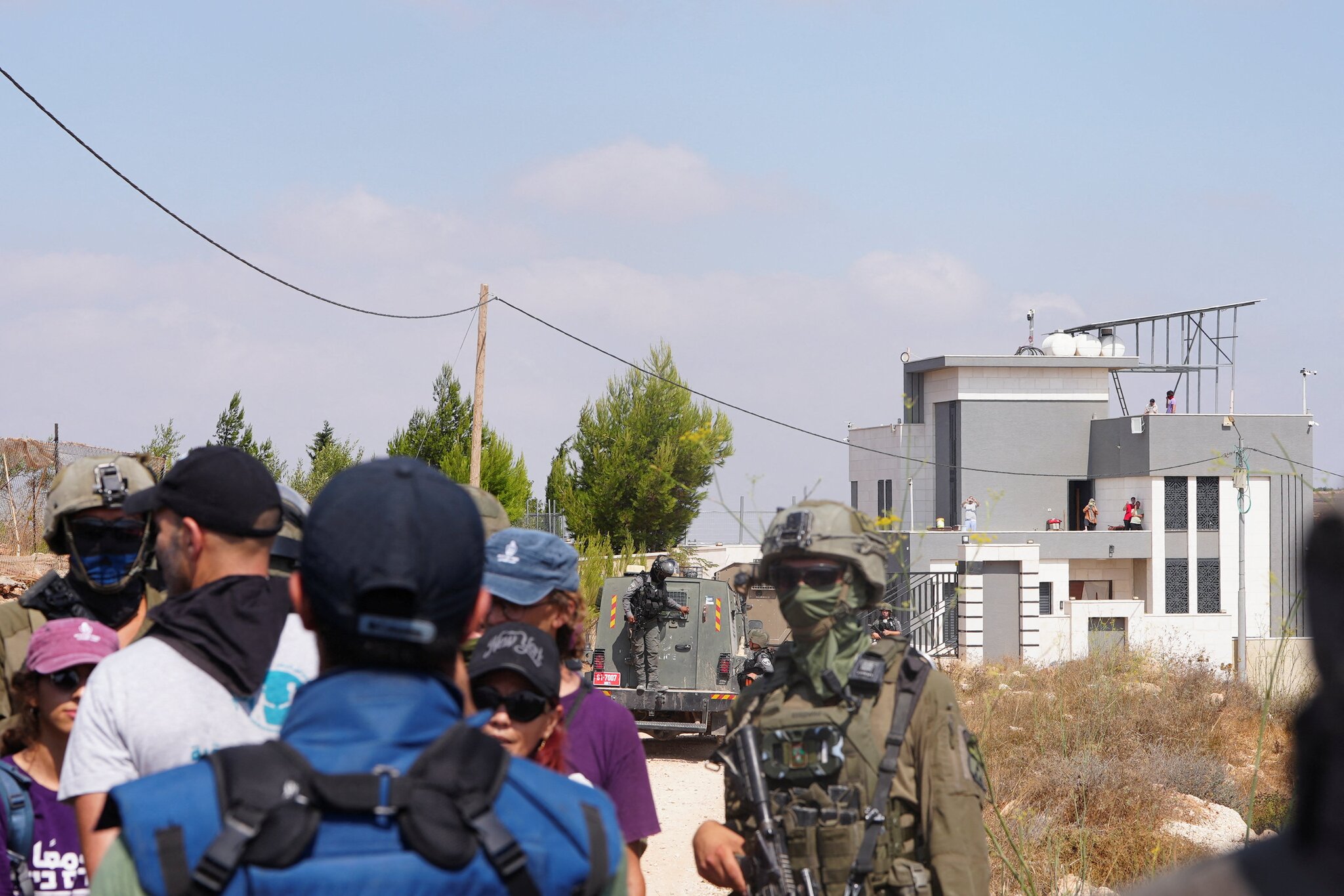 Palestinians besieged in West Bank village of Qusra fear Israeli settlers will seize their homes
