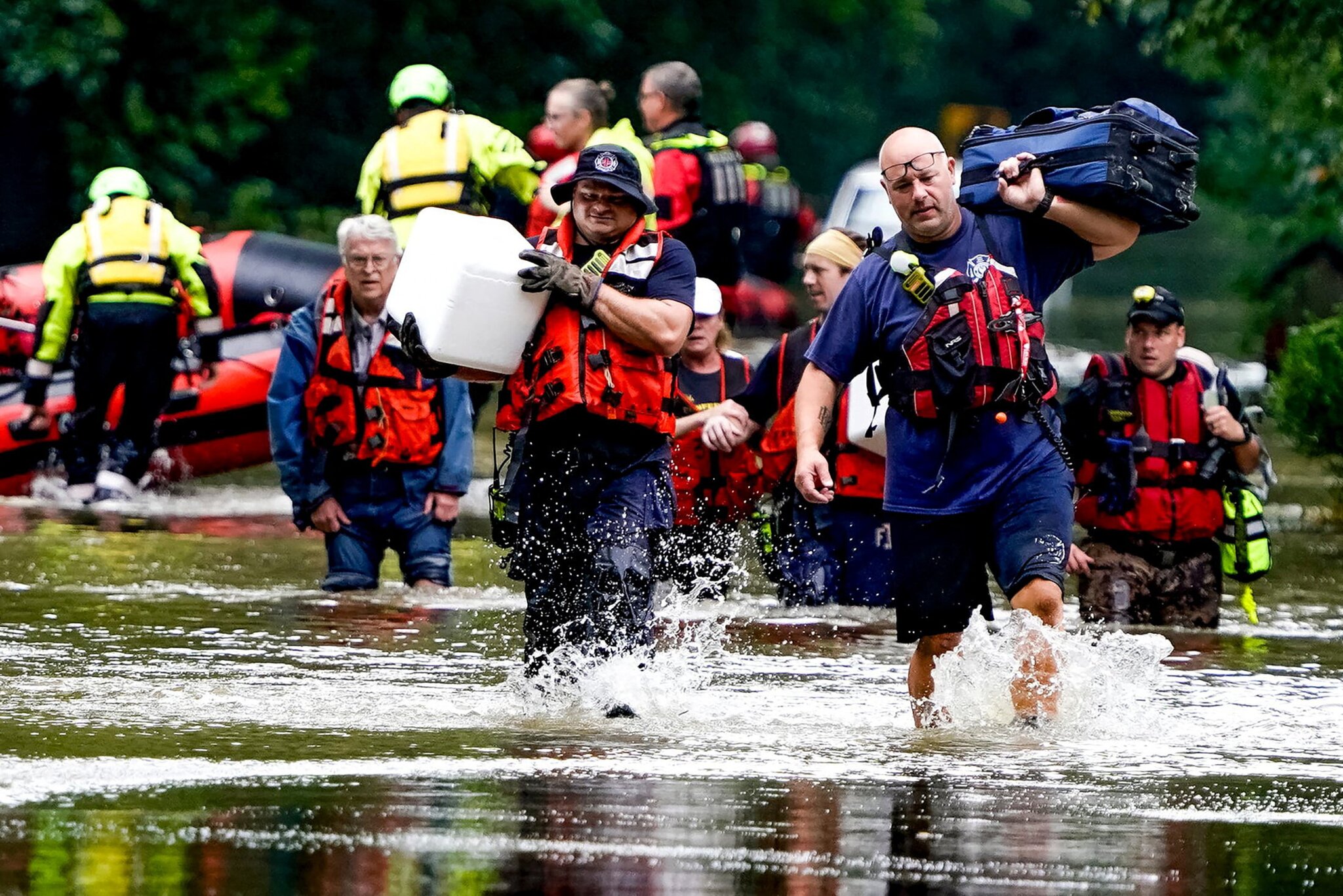 At least 7 people have died from days of heavy rain and record-setting flooding in Indiana