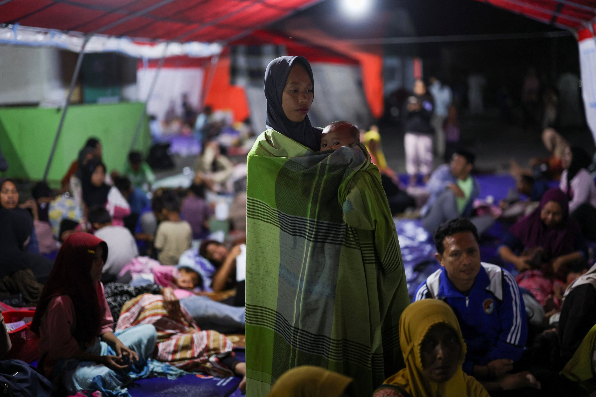 Rescuers in Indonesia recover more bodies in earthquake aftermath, raising death toll to 53