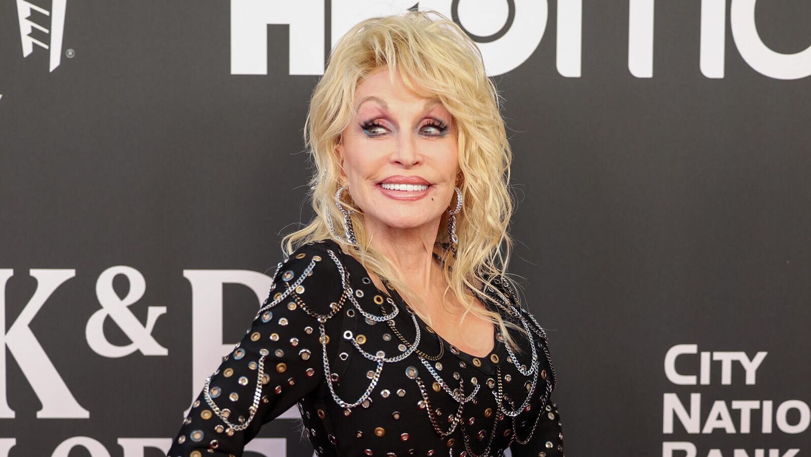 Dolly Parton Misses Dollywood Ride Opening Amid Ongoing “Health Issues”: “See You Down The Road