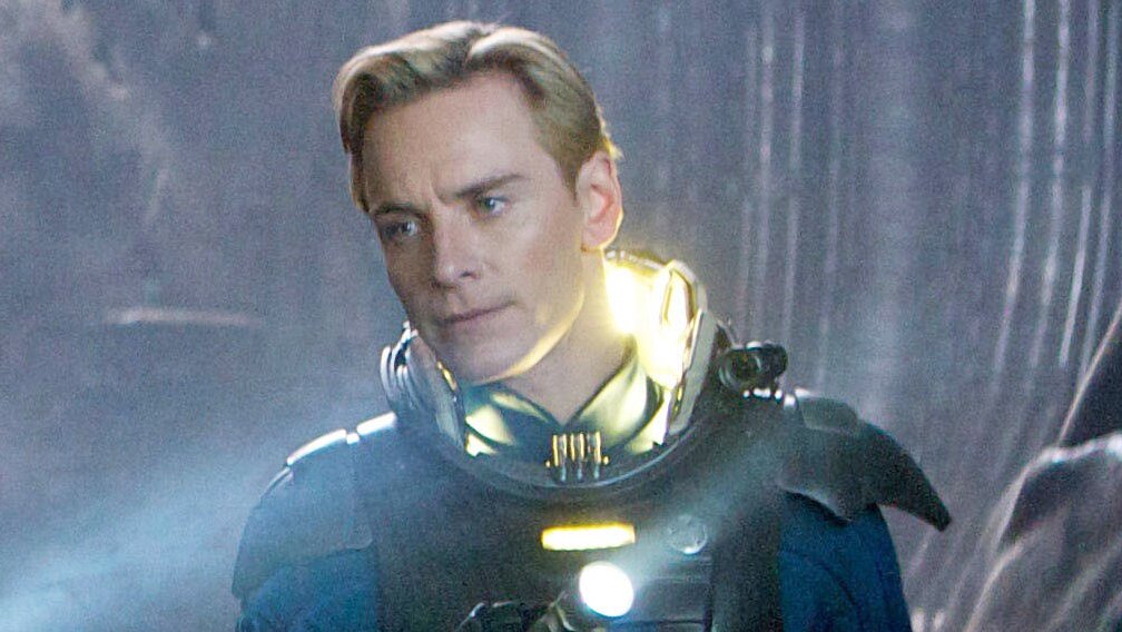 Ridley Scott Teases ‘Alien: Covenant’ Sequel With Michael Fassbender That Explores “F*cking Chaos” Of AI: “Off The Rails