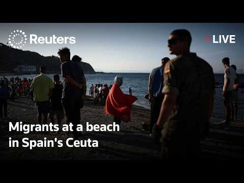 Migrants at a beach in Spain's Ceuta