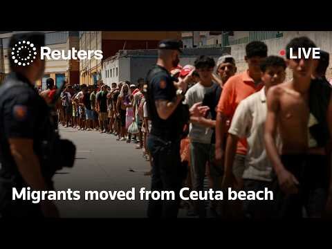 Migrants moved from Ceuta beach to reception centres