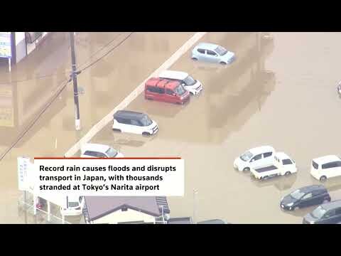 Japan's record rains kill eight, strand thousands at Narita airport