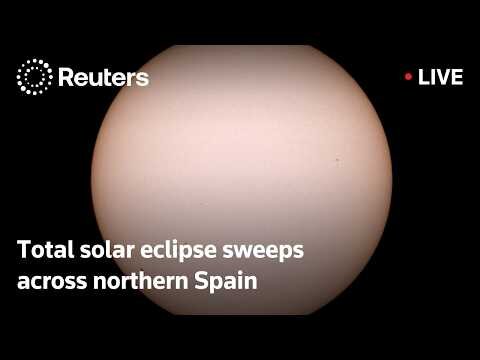 Total solar eclipse sweeps across northern Spain