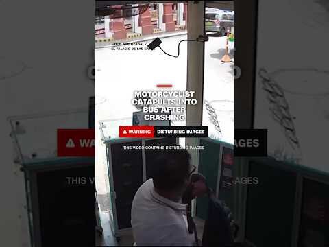 Motorcyclist catapults into bus after crashing