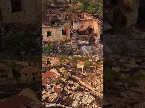 Wildfires char land around North Macedonia village