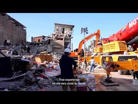 Veteran volunteer digs for survivors after Colombia quake