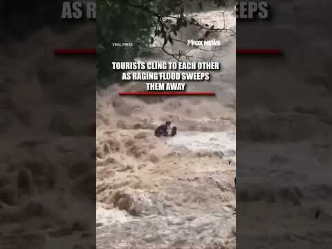 Tourists CLING to each other as flood sweeps them away #shorts #world #news #thailand