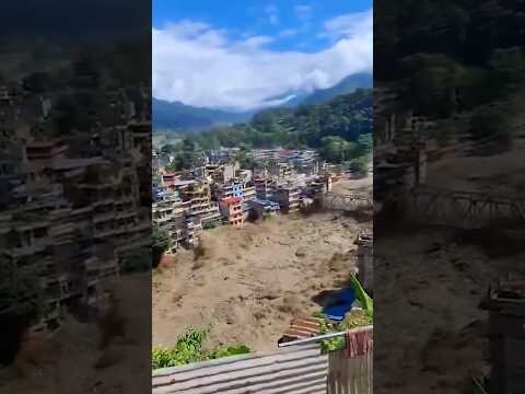 Flood waters destroy bridge in Nepal