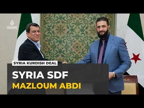 Kurdish-led forces in Syria dissolved: Head of SDF says group has merged with military
