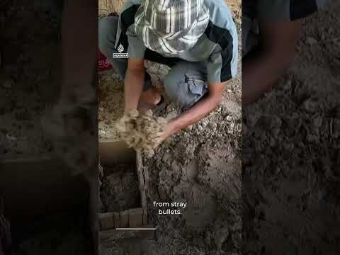 Displaced Palestinian builds mud shelter as tents offer little relief