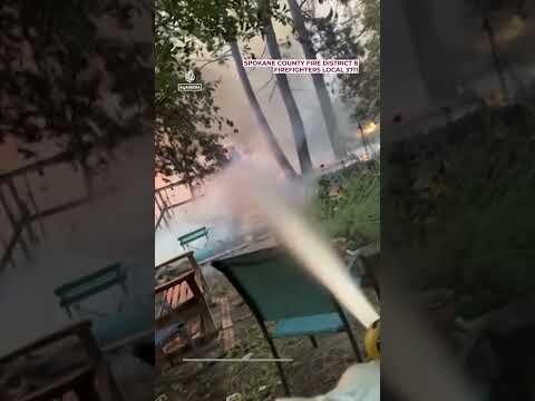 Bodycam video shows firefighters battling blaze in Spokane, US