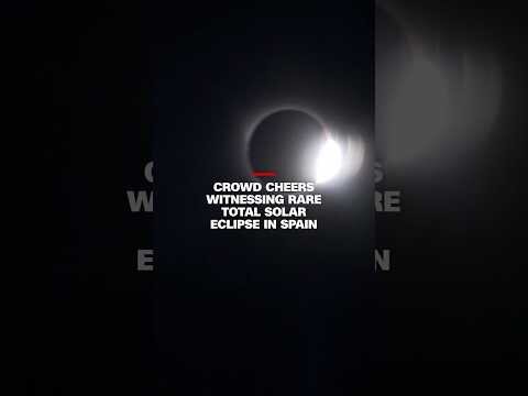 Crowd cheers witnessing rare total solar eclipse in Spain