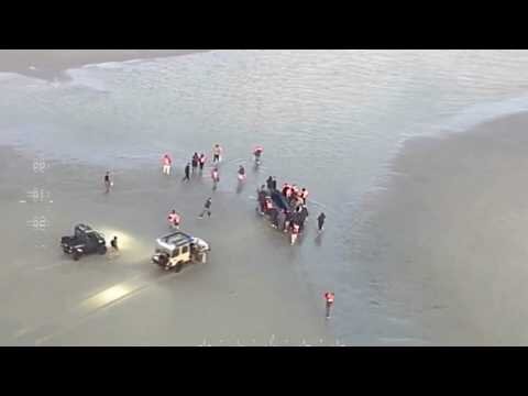 Migrants clash with French police as they attempt to cross the Channel