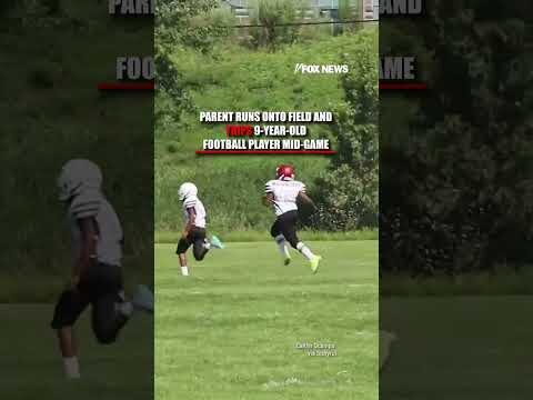 SEE IT: Parent RUNS ONTO field and TRIPS 9-year-old football player mid-game #foxnews #news #shorts