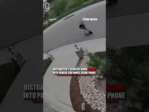 Distracted e-scooter rider SLAMS into parked SUV #shorts #foxnews #viral