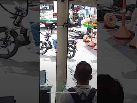 Moment motorcyclist flies through bus door, avoiding deadly crash