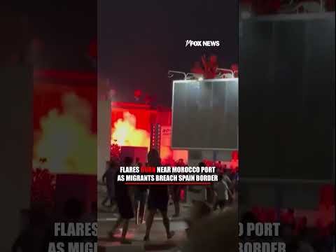 FLAMES BURN as migrants breach Spain border #foxnews #news #us #fox