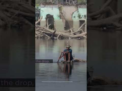 Submerged Indonesian village re-emerges as drought lowers water levels