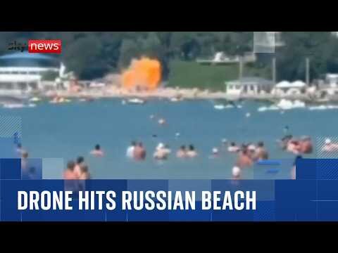 Holidaymakers watch on as drone hits Russian beach