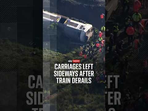 Carriages left sideways after train derails