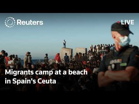 Migrants camp at a beach in Spain's Ceuta