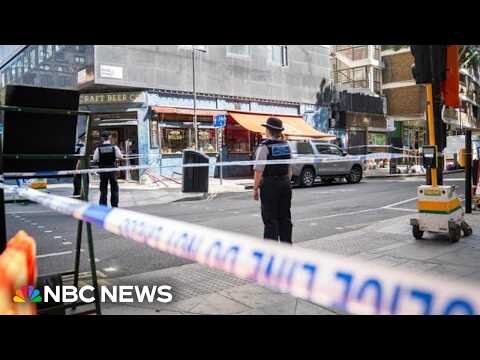 Woman arrested after four people are stabbed in London