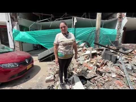 Colombia survivor shelters in ruins after quake damages home