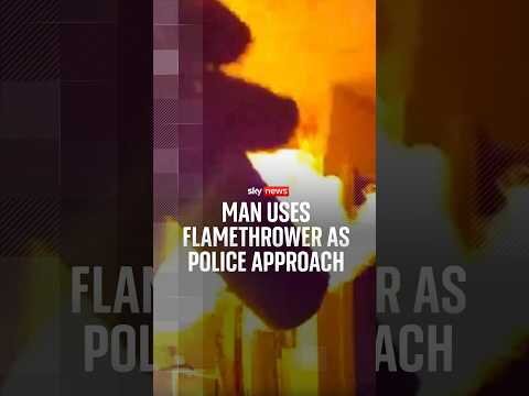 Man uses flamethrower as police approach
