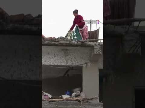 People return to their flood-ravaged homes in Nepal