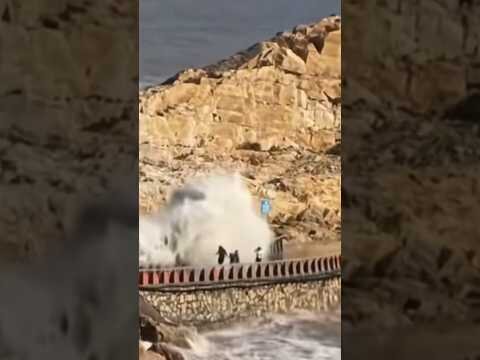 Boy swept away by large wave caused by Typhoon Dolphin