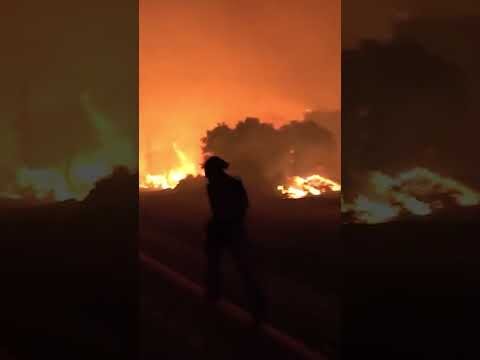 Crews race against Spain's largest wildfire in recent history