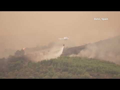 Greek firefighting aircraft battle wildfires in Spain