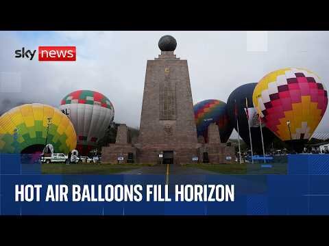Hot air balloons fill sky above Ecuador