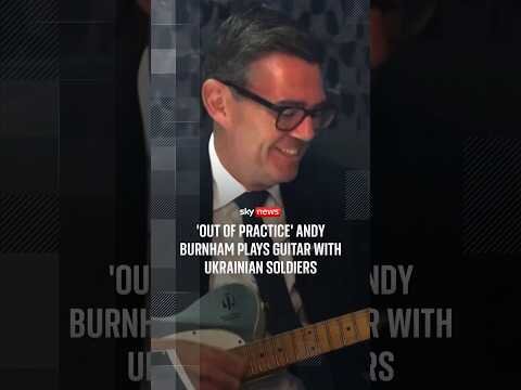 Out of practice' Burnham plays guitar with Ukrainian soldiers