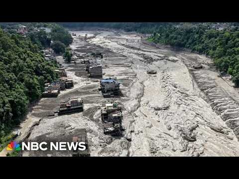 Nepal search efforts underway in difficult terrain of flooded Himalayan foothills